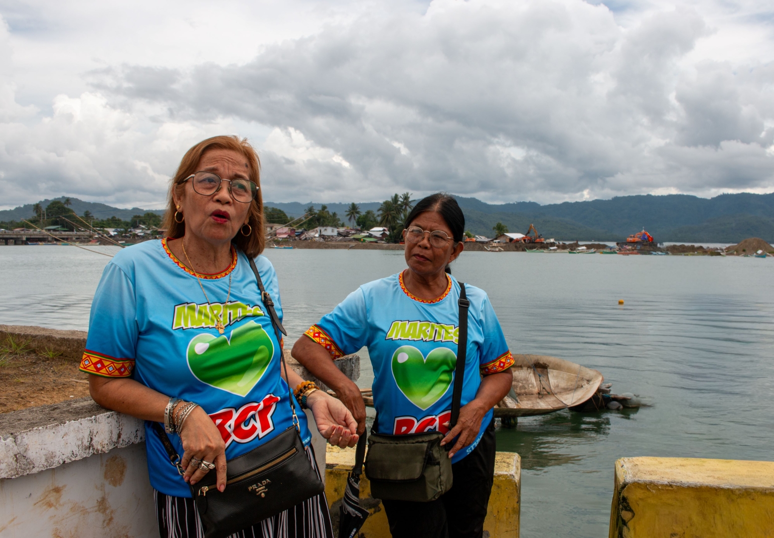 Alma Obod (left), 60, leads the MARITES group in the Dagocdoc community. A solo parent and mother of four, she balances her livelihood as a shopkeeper with volunteering alongside her community.