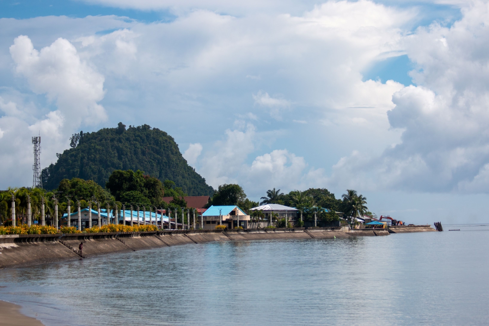 A view of the Tandag shoreline, with the city’s boulevard stretching along the coast toward the Philippine Sea.
